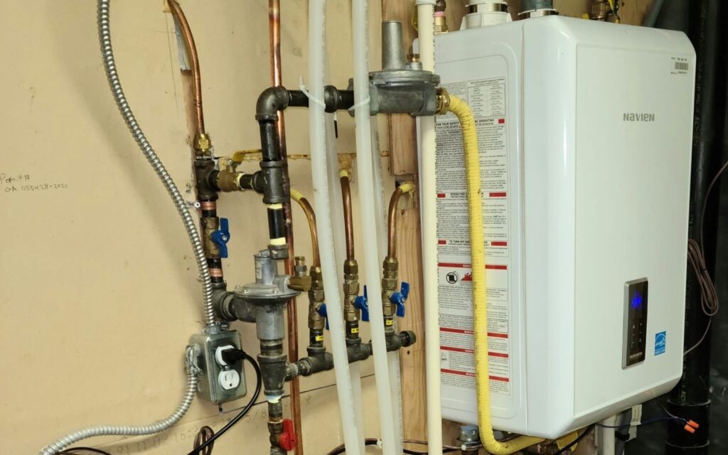 kitchen renovation water heater installation pipes | GPS: 49.040593, -122.677446