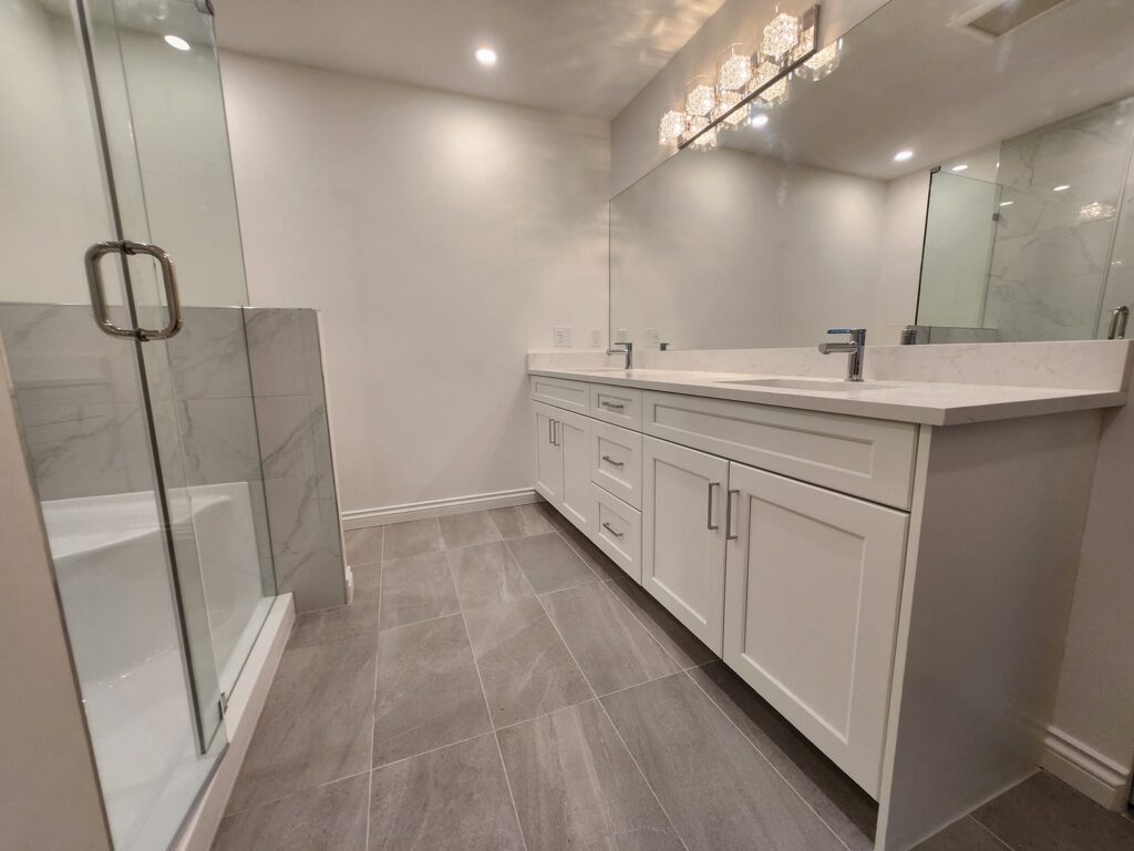 modern bathroom with water heater repair tiles and glass | GPS: 49.052360, -122.659496